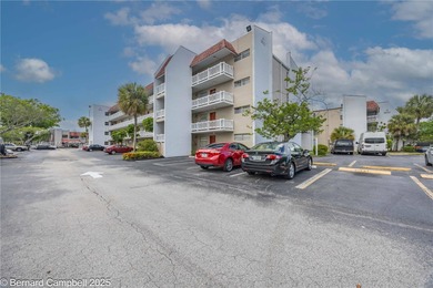 GATED COMMUNITY***First floor Corner Unit condo with lots of