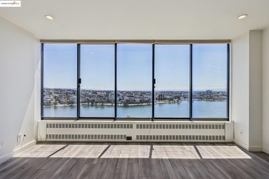 Breathtaking lake views from this bright, impeccably maintained