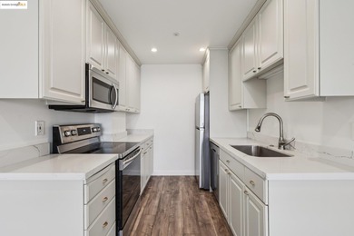 Breathtaking lake views from this bright, impeccably maintained