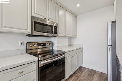 Breathtaking lake views from this bright, impeccably maintained