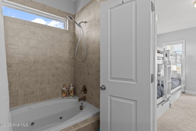 Gorgeous 5 bedroom, 4.5 bath coastal duplex just 3 houses from