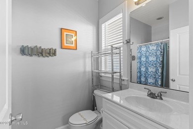 Gorgeous 5 bedroom, 4.5 bath coastal duplex just 3 houses from