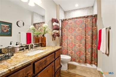 Guadalupe River?front living at its finest! Nestled in the gated