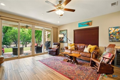 Guadalupe River?front living at its finest! Nestled in the gated