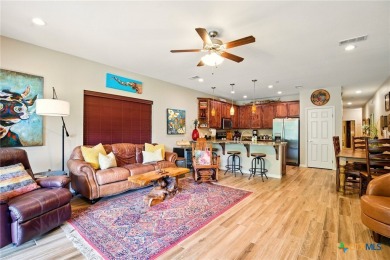 Guadalupe River?front living at its finest! Nestled in the gated