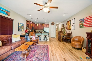 Guadalupe River?front living at its finest! Nestled in the gated