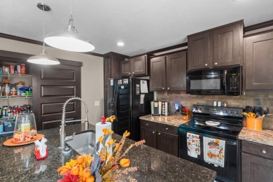 Escape to your own private retreat on over an acre of wooded