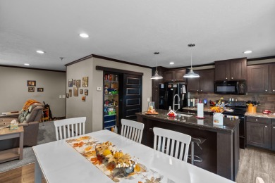 Escape to your own private retreat on over an acre of wooded