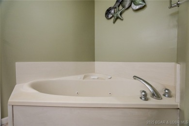 Lakefront Living with Style & Comfort! Step into this fully