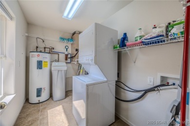 Lakefront Living with Style & Comfort! Step into this fully