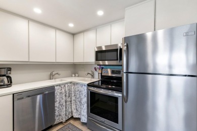 Tradewinds Beachfront end-unit Condo. Tile through-out with