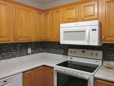 Inviting 2nd floor condo in the desirable Cloisters of Forest