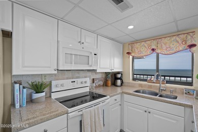 Welcome to Paradise! A fourth floor, fully furnished end unit