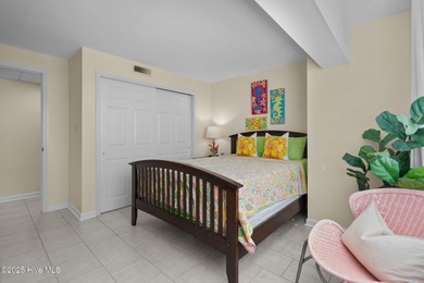 Welcome to Paradise! A fourth floor, fully furnished end unit