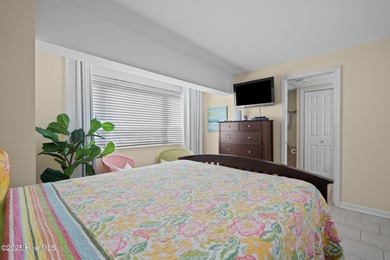 Welcome to Paradise! A fourth floor, fully furnished end unit