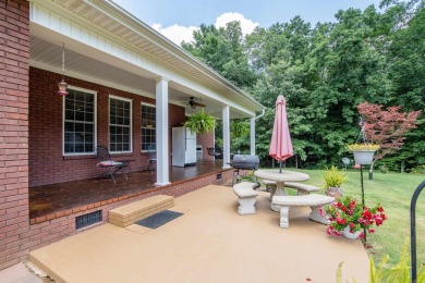 Nestled minutes from Pickwick Lake, this stunning gem has
