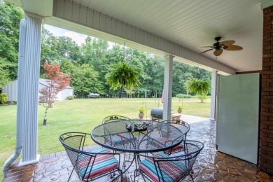 Nestled minutes from Pickwick Lake, this stunning gem has