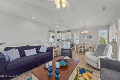 This meticulously maintained four-bedroom, three-bath waterfront