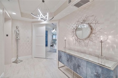 This refined 16th-floor residence in Seaglass at Bonita Bay