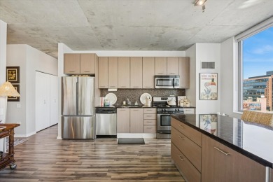 Experience luxury city living in this highly sought-after corner