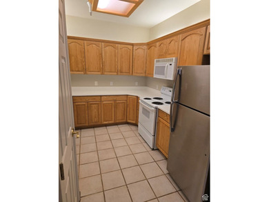 Affordable second Floor 55+ unit in East Sandy! This is an