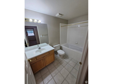 Affordable second Floor 55+ unit in East Sandy! This is an