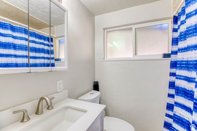 This beautifully remodeled 4-bedroom, 3-bathroom gem perfectly