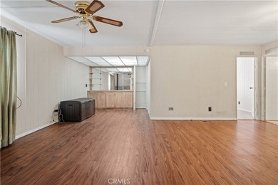 Spacious and inviting triple-wide home in a welcoming 55+