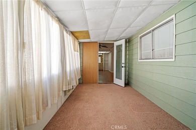 Spacious and inviting triple-wide home in a welcoming 55+