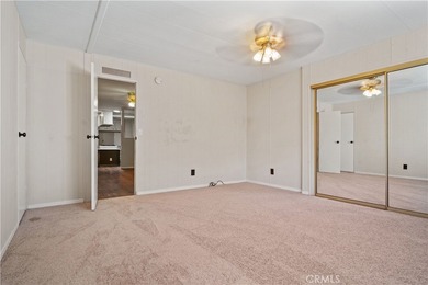 Spacious and inviting triple-wide home in a welcoming 55+