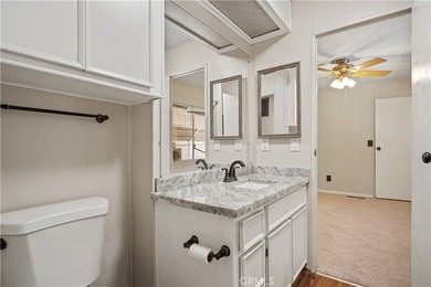 Spacious and inviting triple-wide home in a welcoming 55+