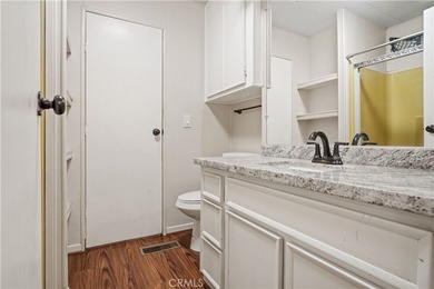 Spacious and inviting triple-wide home in a welcoming 55+