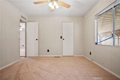 Spacious and inviting triple-wide home in a welcoming 55+