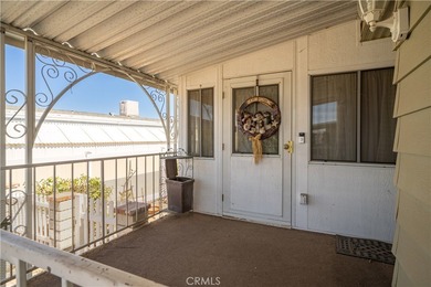 Spacious and inviting triple-wide home in a welcoming 55+