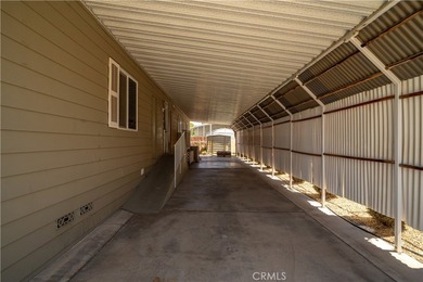 Spacious and inviting triple-wide home in a welcoming 55+