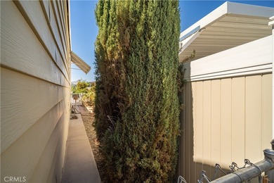 Spacious and inviting triple-wide home in a welcoming 55+