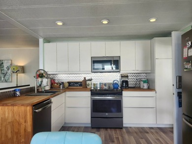 Made you look! This spectacular 2/2 open concept is ready for