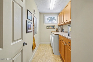 A Boater's Paradise Awaits! Discover this exclusive enclave of