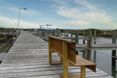 A Boater's Paradise Awaits! Discover this exclusive enclave of