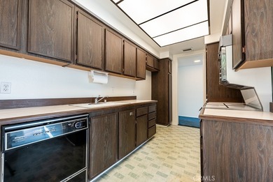 Attention investors and visionaries! This vacant condo needs