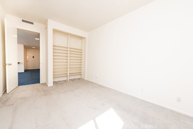 Attention investors and visionaries! This vacant condo needs