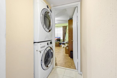 WASHER/DRYER INSIDE THE CONDOPresenting this meticulously