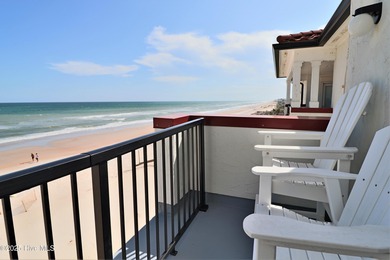 Direct Oceanfront 2 Story townhome style condo located in the
