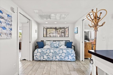 This beautifully updated second-floor condo, located in the