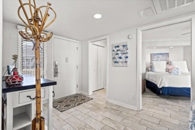 This beautifully updated second-floor condo, located in the