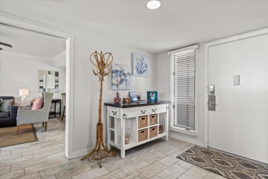 This beautifully updated second-floor condo, located in the