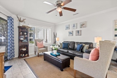 This beautifully updated second-floor condo, located in the