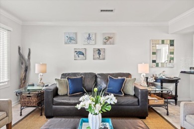 This beautifully updated second-floor condo, located in the