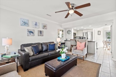 This beautifully updated second-floor condo, located in the