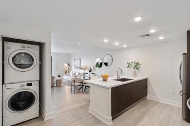 ELEGANT CONDO IN THE PRESTIGIOUS ENVY RESIDENCES. SPACIOUS OPEN